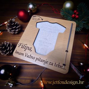 Zapaljiva vatrena pitalica u obliku dječjeg bodija sa skrivenom porukom – tražiš li poseban način da pitaš buduću kumu?