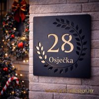 Dizajnerski kućni broj s kružnim reljefnim vijencem i minimalističkom estetikom – što pokloniti za novi dom koji voli miran dizajn?